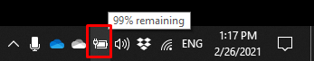 Windows system tray showing charging battery icon and percentage remaining