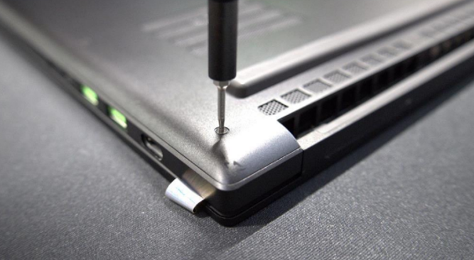 Remove the screws that secure the back cover